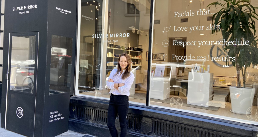 Cindy Kim stands in front of the Silver Mirror storefront